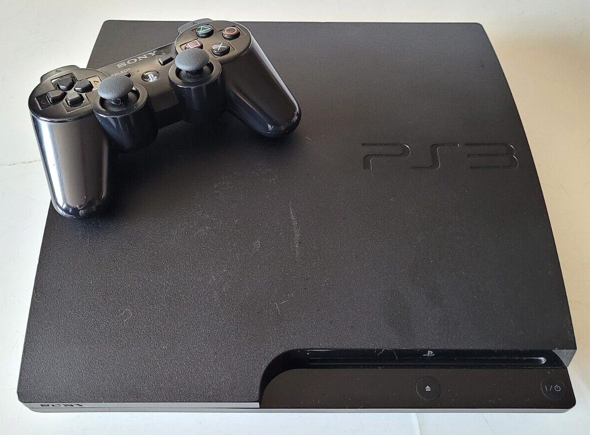 PS3 +20 JEUX 2 MANETTES