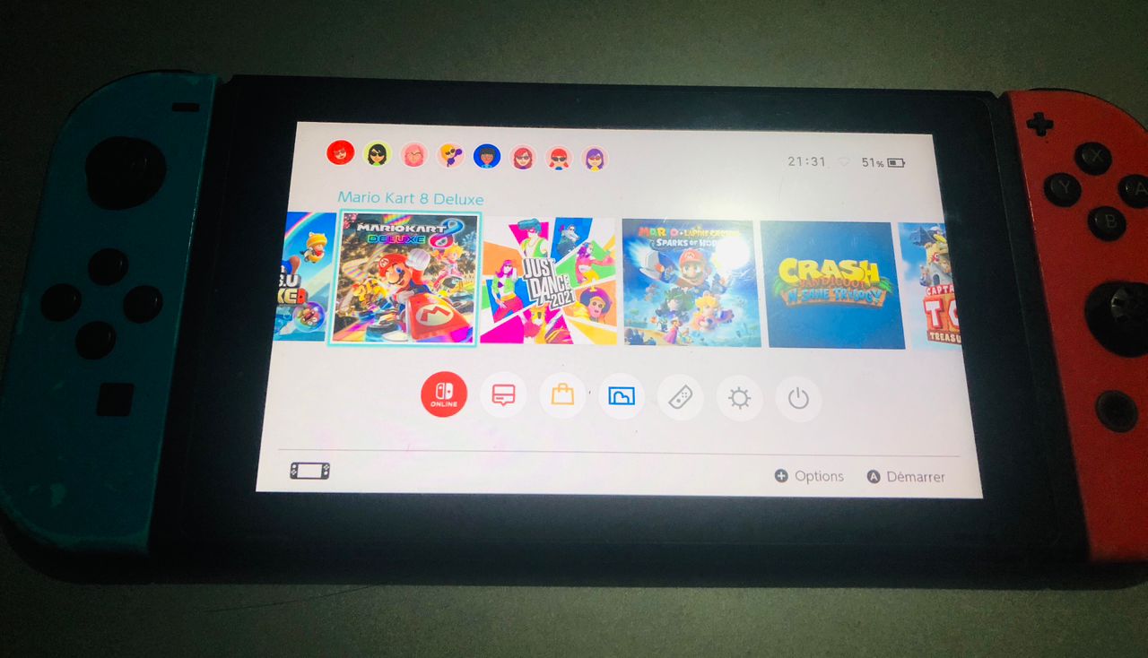 Nintendo switch cracké avec 12 jeux et chargeur d’origine