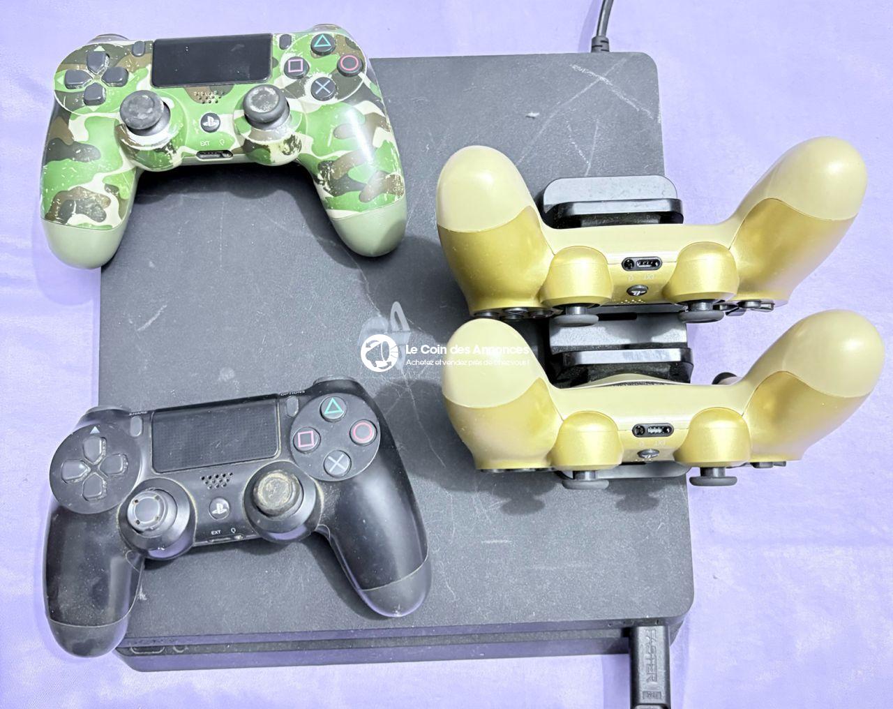 Ps4 Slim avec 4 manettes et 10 jeux