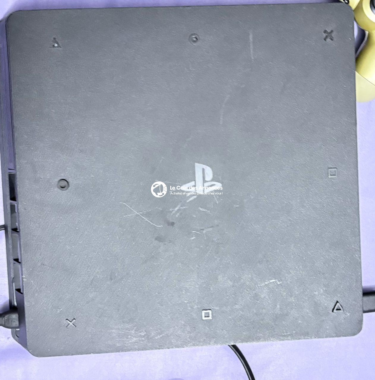 Ps4 Slim avec 4 manettes et 10 jeux